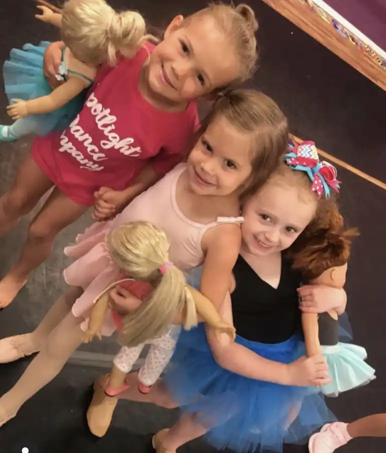 Young students enjoying a toddler dance class at Spotlight Dance Company